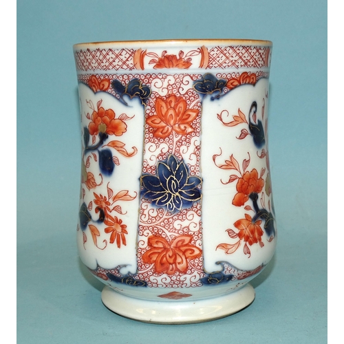 102 - Chinese 18th century, an Imari baluster tankard, 15cm high, (hairline crack to base of handle).... 