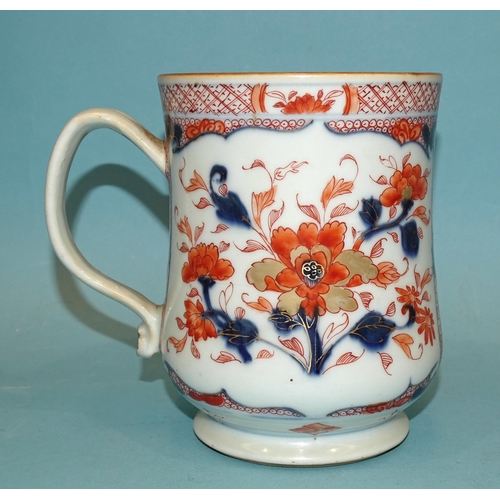 102 - Chinese 18th century, an Imari baluster tankard, 15cm high, (hairline crack to base of handle).... 