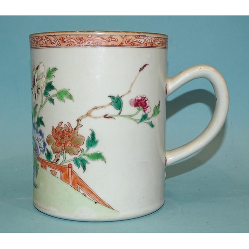 103 - Chinese 18th century, a large famille rose mug, 14cm high, (rim chip).