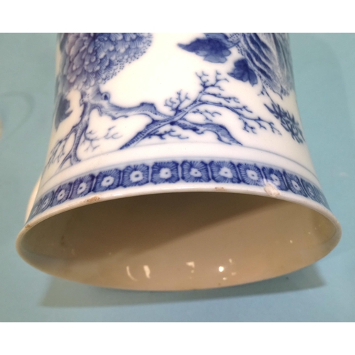 104 - Chinese 18th century, a large soft paste baluster shape blue and white tankard, 15cm high, (slight r... 