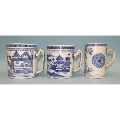 107 - Chinese 18th century, two blue Canton export tankards with crossover handles, 11.5cm and 11cm high a... 