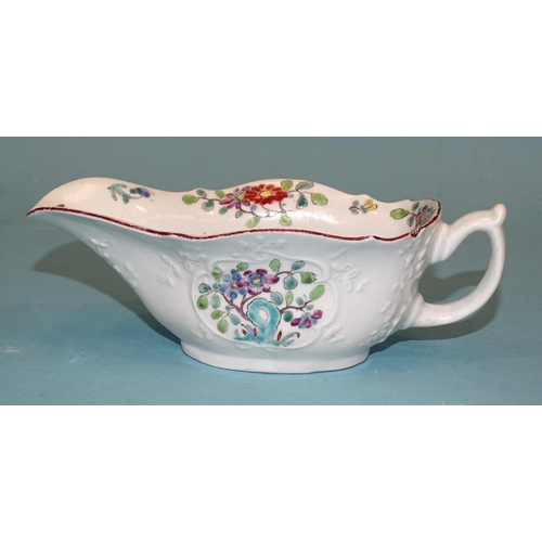 114 - A Worcester moulded famille rose sauce boat, 6cm high, 15cm long, (chip and rim restoration).... 