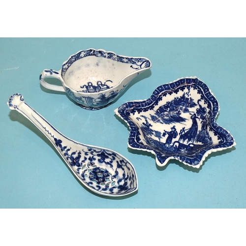 115 - A Worcester pierced spoon, 13.5cm, a Caughley pickle dish, 2.5cm high, 11.5 x 10.5cm and a Derby blu... 