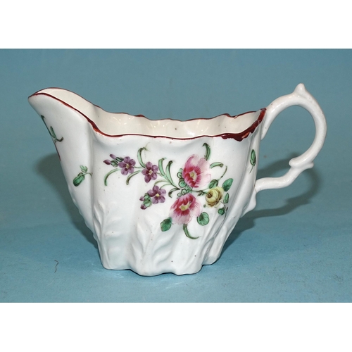 120 - A Bristol moulded cream boat, 7cm high, (handle cracked).