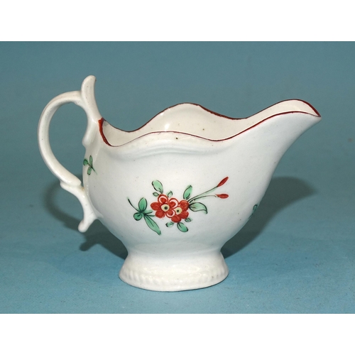 122 - A small Worcester cream boat, 6.5cm high, with floral sprays.