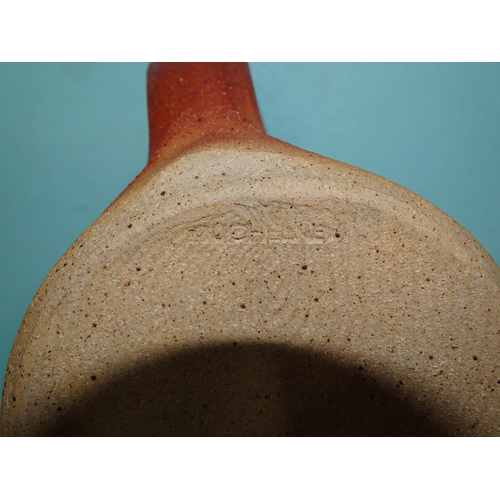 129 - A group of Muchelney studio pottery: storage pot with lid, partially-glazed tall jug, tankard and tw... 