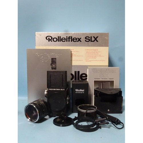 194 - A Rollei SLX camera, serial no.602250084, with Rollei HFT Planar f2.8 80mm lens, film holder, lens h... 