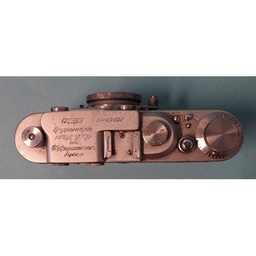 195 - A Russian FED 50mm camera no.49197, in leather case.