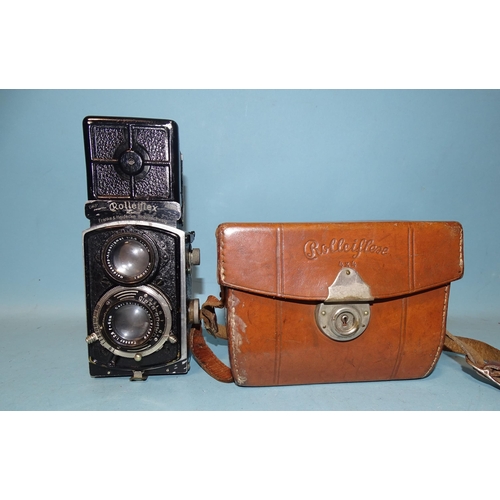 204 - A Rolleiflex Baby 4x4 TLR camera 1933, Type 1, serial no.154343, with filters, in leather case, with... 