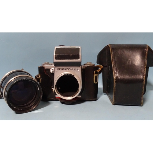 209 - A Pentacon Six medium format SLR camera body, serial no.11623, in leather case, with Carl Zeiss Jena... 