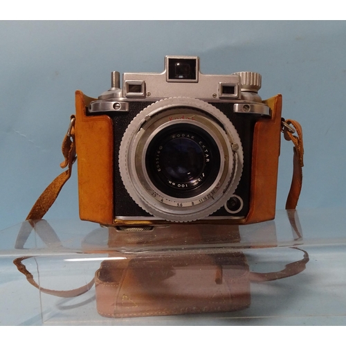 219 - A Kodak Medalist II camera with Kodak Ektar f3.5 100mm lens and leather case, (shutter working).... 