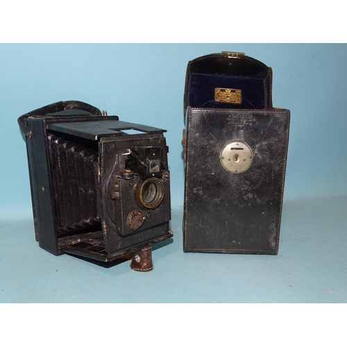 221 - An Adams Idento folding plate camera, serial no.4167, with Zeiss Patent 11½'' lens, in leather case.... 