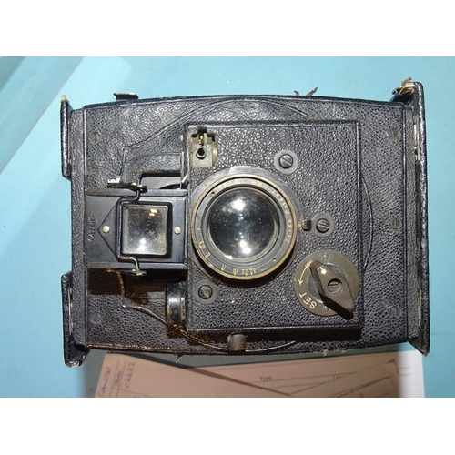 221 - An Adams Idento folding plate camera, serial no.4167, with Zeiss Patent 11½'' lens, in leather case.... 