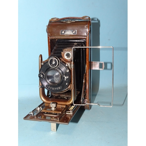 222 - The Houghton-Butcher MFG Co. Ltd No.12 Ensign Carbine Tropical folding camera, with mahogany and oxi... 