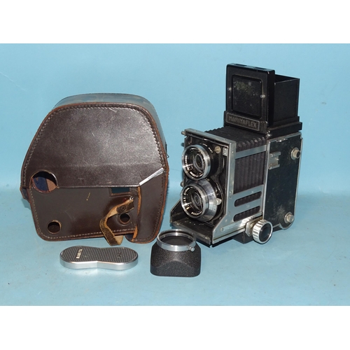 223 - A Mamiyaflex C TLR camera, serial no.79237, with Sekor f3.5 105mm lens, in leather case, (shutter wo... 