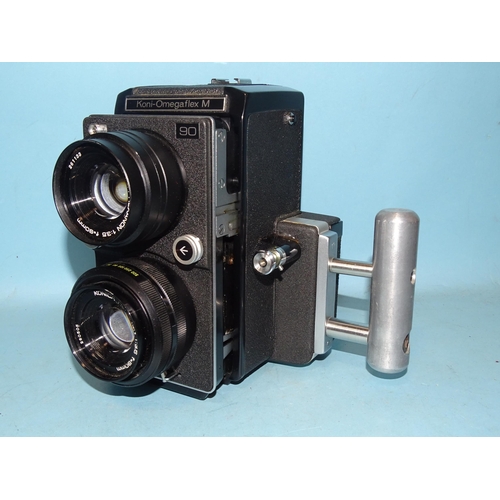 241 - A Konica Koni-Omegaflex M TLR camera, serial no.70207Y, with Konica Hexanon f3.5 90mm lenses and spa... 