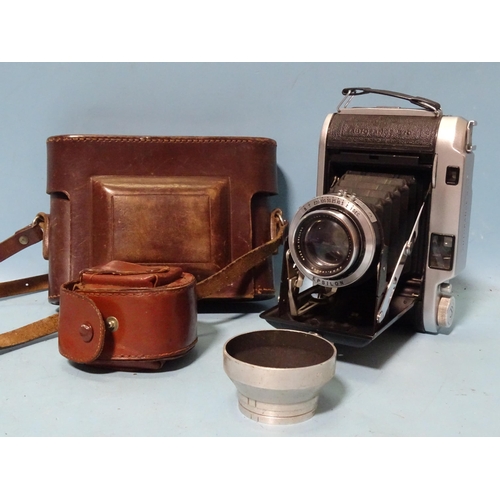 246 - An Ensign Autorange 820 rangefinder camera, with Ross Xpres f/3.8 105mm lens, (shutter not working).... 