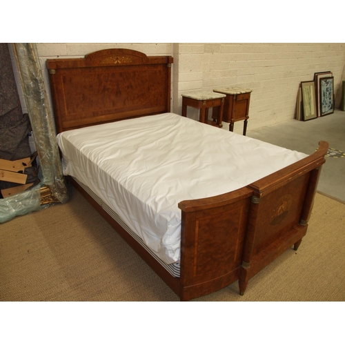 43 - A late-19th/early-20th century French walnut 5ft bed with gilt metal mounts, inlaid with mother-of-p... 