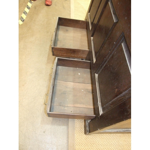 48 - An early-18th century oak mule chest, with hinged lid above three folded panels and two base drawers... 