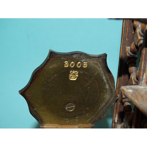 76 - A similar cold-painted bronze group depicting a coffee seller in his stall, the inkstand with hinged... 