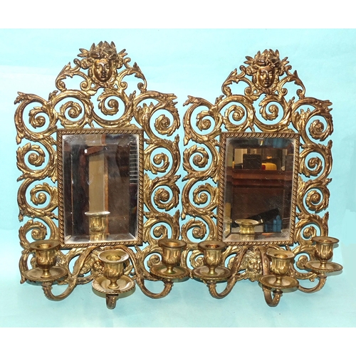 79 - A pair of early-19th century gilt-metal girandole, each of pierced foliate scrolling form, embellish... 