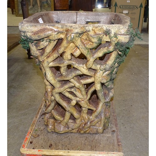 70 - A pair of salt-glazed stoneware garden seats in the form of intertwined roots with oak leaf seat, 47... 