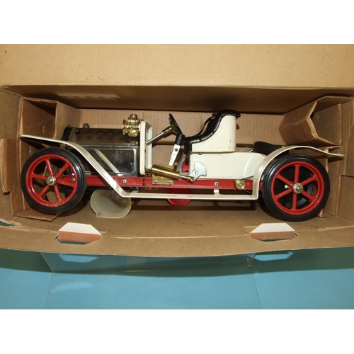 173 - A Mamod Steam Roadster SA1 live steam car, with burner, (in box).