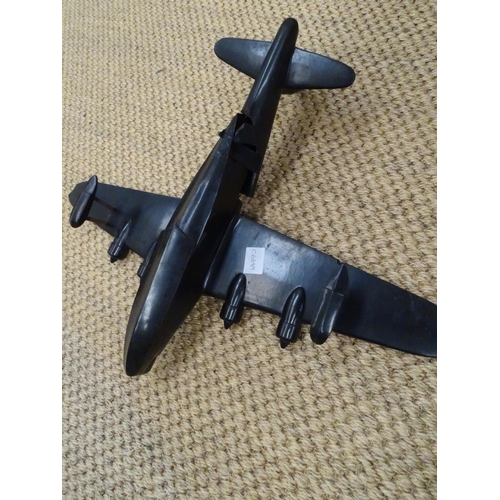 188 - A WWII black Bakelite aircraft recognition model (broken through tail), a Dinky 23c Mercedes-Benz ra... 