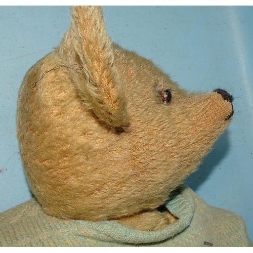 196 - A teddy bear c1920's/1930's, with prominent upturned snout, glass eyes, large ears, mohair plush, in... 