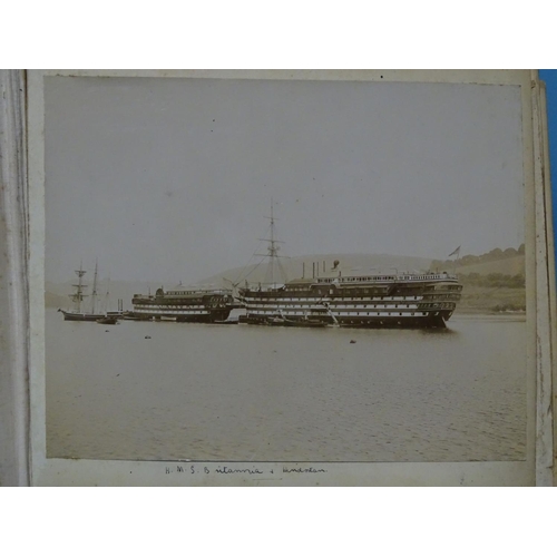 46 - An album of early-20th century naval photographs, including HMS Britannia & HMS Hindostan, crew,... 