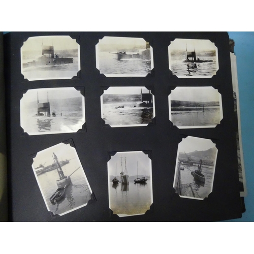 48 - An album of approximately 380 photographs, mainly small snaps, 1930's, including submarines, ships, ... 