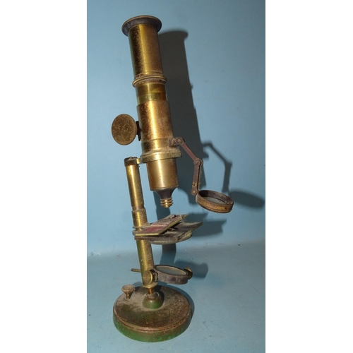 529 - An early-20th century brass monocular microscope.