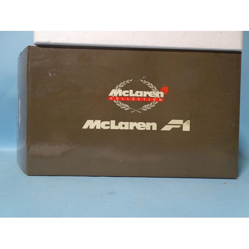 79 - Paul's Model Art, 1:12 scale McLaren F1 Sports/Road Car, dark metallic green, (boxed with packing, m... 