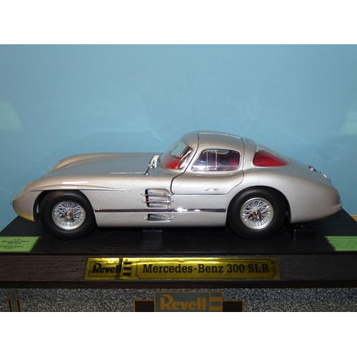 82 - Guiloy, a 1:18 scale Aston Martin DB7 and a Revell 1:12 '54 Mercedes 300SLR, (both boxed with plinth... 