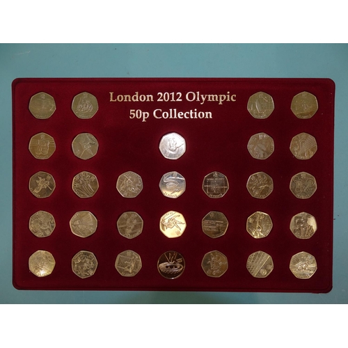 430 - Royal Mint, 'London 2012 Olympic 50-pence Collection', a set of twenty-nine sports 50-pence pieces w... 