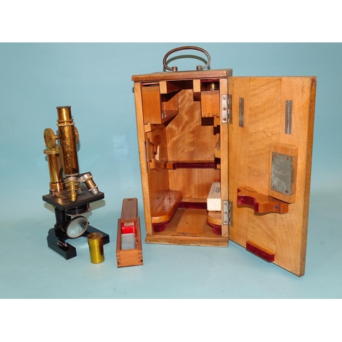 534 - An early-20th century lacquered brass and black-lacquered monocular microscope by E. Leitz, Wetzlar,... 