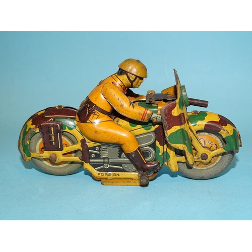 187 - A Japanese c/w tinplate military motorcycle and rider, maker 'KT', 14cm long, (two small driving whe... 