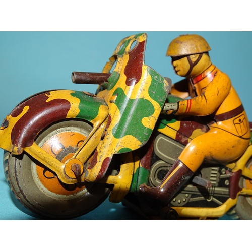 187 - A Japanese c/w tinplate military motorcycle and rider, maker 'KT', 14cm long, (two small driving whe... 