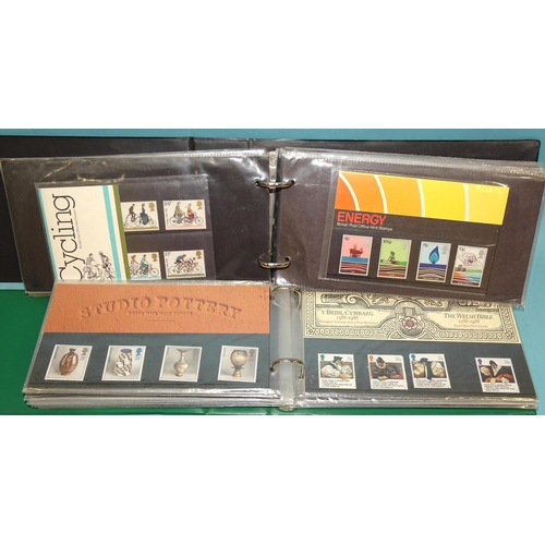 34 - A quantity of mint Great British decimal issues in two albums and loose, with presentation packs, et... 