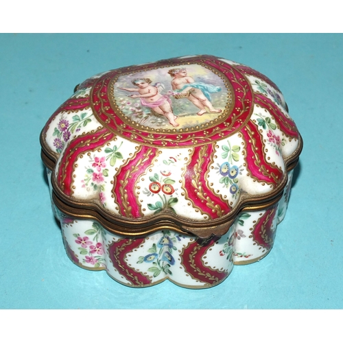 88 - A Continental gilt metal-mounted porcelain shell-shaped trinket box, with puce, gilt and floral deco... 