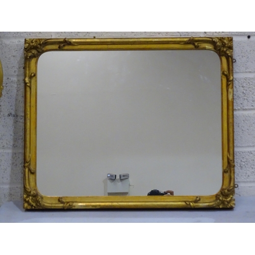 105 - A gilt wood wall mirror with carved foliate frame enclosing the later mirror plate, 75 x 62cm, (old ... 