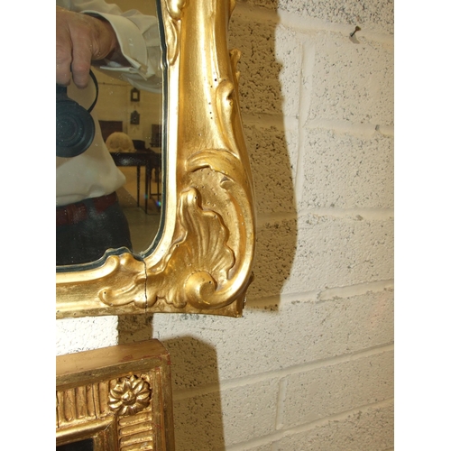 105 - A gilt wood wall mirror with carved foliate frame enclosing the later mirror plate, 75 x 62cm, (old ... 