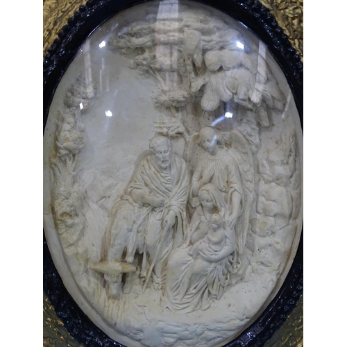 117 - A plaster relief plaque titled A Penar. Leon Sevilla?, with two figures on horseback, within a glaze... 