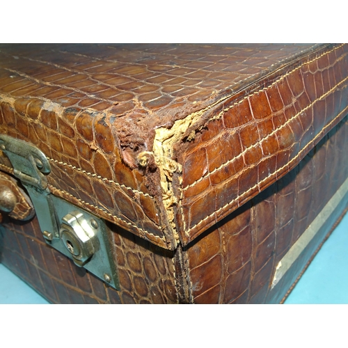 118 - A crocodile skin suitcase by The North West Tannery Co. Ltd, Cawnpore, 56 x 37cm and a smaller suitc... 