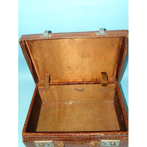 118 - A crocodile skin suitcase by The North West Tannery Co. Ltd, Cawnpore, 56 x 37cm and a smaller suitc... 