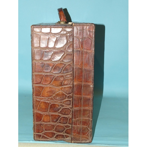 118 - A crocodile skin suitcase by The North West Tannery Co. Ltd, Cawnpore, 56 x 37cm and a smaller suitc... 