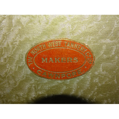 118 - A crocodile skin suitcase by The North West Tannery Co. Ltd, Cawnpore, 56 x 37cm and a smaller suitc... 