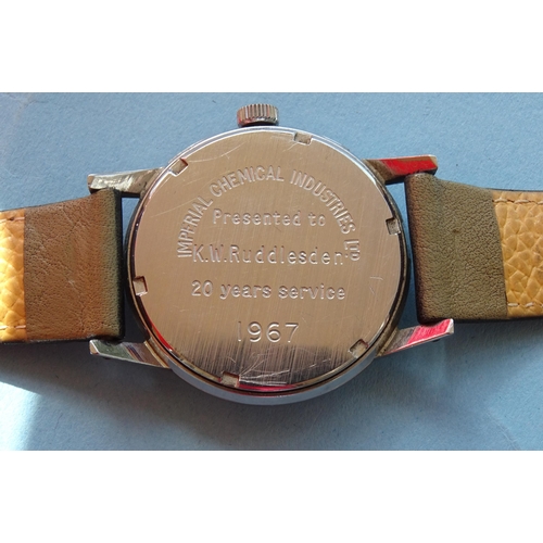 140 - Garrard, a gentleman's steel-cased manual wind wrist watch, the silvered dial with Arabic numerals, ... 