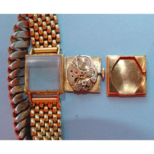 149 - A lady's 14k-gold-cased square-faced wrist watch, 19mm, marked Canterbury, on plated bracelet, (work... 