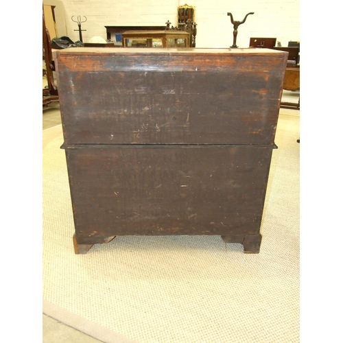 23 - An early-18th century walnut feather-banded bureau, the fall enclosing a fitted interior above two s... 